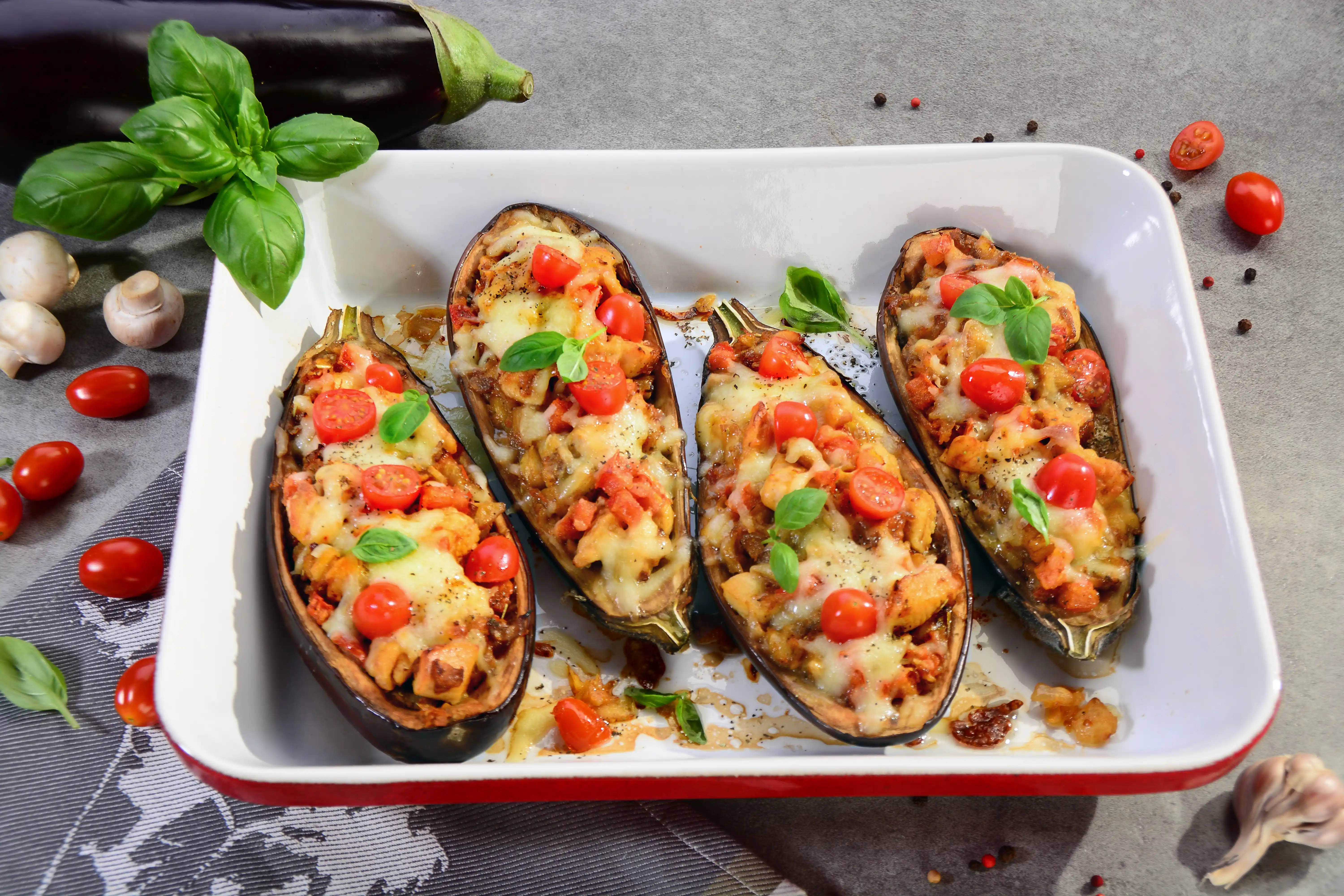 Baked aubergine with chicken and vegetables